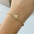 Pulseira escapulário com a imagem do Espírito Santo banhada a ouro 18k - comprar online