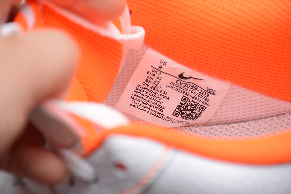 Nike orange and white 2025 sneakers