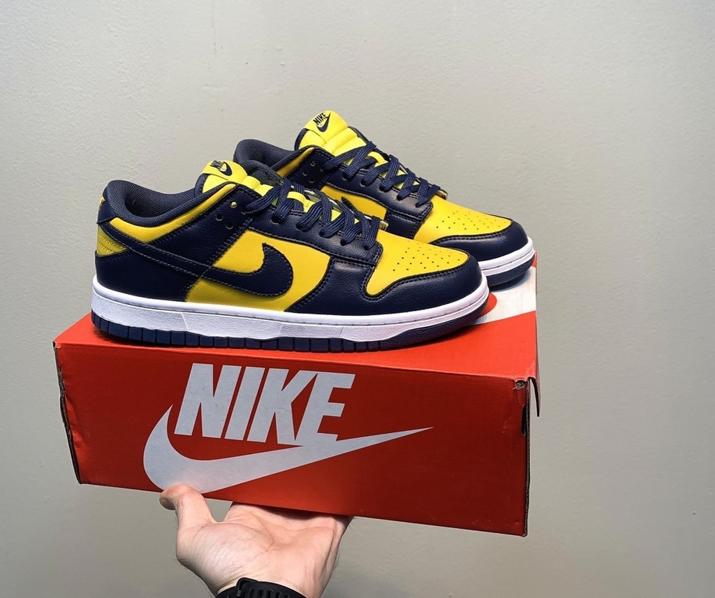 Blue yellow hot sale nikes