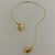 COLAR CHOKER ARO GOTA LISA DOURADO na internet