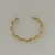 BRACELETE TORCIDO LISO FINO DOURADO - comprar online