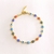 Pulsera con eslabones ojo colores 18 k premium - comprar en línea