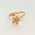 Anillo con estrellas y pedrería