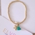 Pulsera bolitas con dije de estrella y motita - comprar en línea