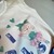 Imagem do Conjunto Kaiani Bichinhos Blusa e Saia