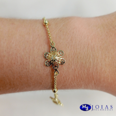 PULSEIRA FLOR COM DETALHE EM BOLINHAS FOLHEADAS A OURO 18K