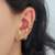 BRINCO EAR HOOK GOTA FOLHEADO EM OURO 18K