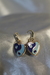 Aretes corazon jing jang en internet