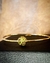 Joalheria Particular - Bracelete em ouro amarelo 18k com esfera decorada com peridotos.