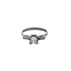 Platinum Solitaire Engagement Ring with French Diamonds