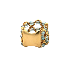 Large Italian 18 kt gold and Topaz ring on internet