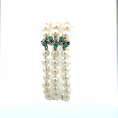 Natural platinum emerald and brilliant pearl bracelet