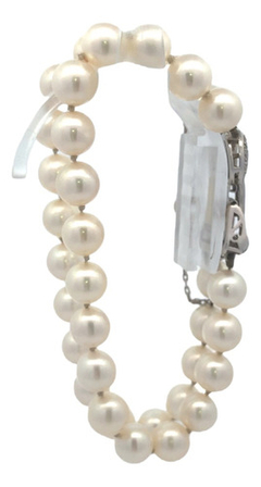 18 kt gold natural pearl cuff bracelet with diamonds. - Joyería Alvear