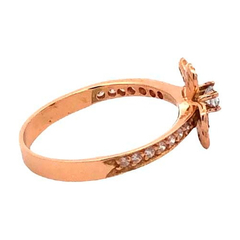 Delicate 18 carat gold ring and white sapphires on internet