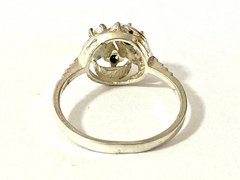 Beautiful 925 silver ring and white sapphires on internet