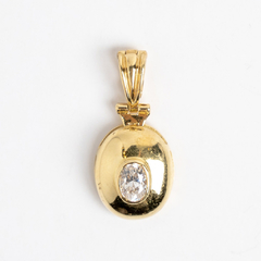 18kt Gold Pendant Charm. and Sapphire