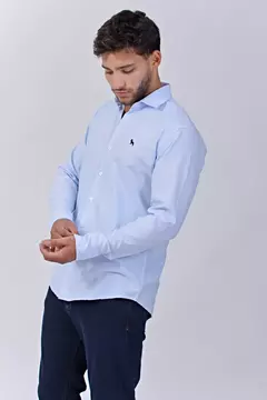 CAMISA OXFORD CELESTE BRAVO. en internet