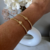 Pulseira Bracelete BolInha com Estrela Banhada Ouro 18K - della fiori semi joias