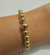 PULSEIRA GRAVATA BOLINHA BANHADA A OURO 18K - comprar online