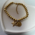 PULSEIRA BOLINHAS COM PINGENTE BANHADO A OURO 18K - comprar online