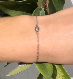 Pulsera plata ojito