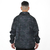 JAQUETA CORTA-VENTO ANORAQUE WATS - PRETO CAMUFLADO - comprar online