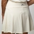 Shorts Saia com pregas off white - comprar online