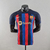 Camisa Barcelona 22/23 Jogador Nike Masculina - Azul e Grená - comprar online
