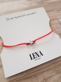 PULSERA DE HILO ROJO CON DIJE ESTRELLA AQ en internet