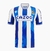 Camisa Real Sociedad 22/23 Macron Torcedor - Azul e Branco