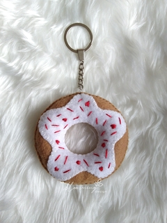 Fun donut with white glaze and red decorations