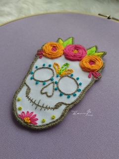 Hand Embroidered Brooch - Skull with Orange Flowers on internet