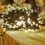 Pisca Fixo 100 Lâmpadas LED Branco Quente - Fio Verde - comprar online