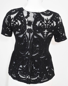Blusa negra ZARA en internet