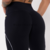 MOVING - LEGGING LINEAR EMPINA BUMBUM LISA PRETA/BRANCA - loja online