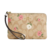 Muñequera Coach monogram flores