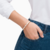 Pulsera Kate Spade blanca con dorado en internet