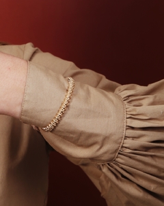 Bracelete Feminino Design Moderno de Bolinhas Banhado a Ouro 18K - comprar online