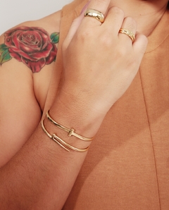 Bracelete Feminino Regulável Design Cruz Banhado a Ouro 18K na internet