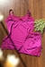 Conjunto short doll em liganete na cor rosa, com detalhes em renda na parte superior e nas laterais do short.