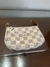 Louis Vuitton Mini Pochette - comprar online