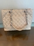 Bolsa Chanel Grand Shopping Off White na internet