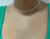 CHOCKER DUPLA BOLINHAS DE CRISTAIS E PLAQUINHAS FOLHEADA A PRATA