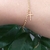 Pulseira Feminina elo Português com cruz, banhado em Ouro 18k