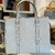 Bolsa Gucci GG Embossed Tote Bag Off-White - comprar online