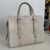 Bolsa Gucci GG Embossed Tote Bag Off-White - loja online