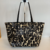 Bolsa Kate Spade Tote Animal Print na internet