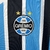 Camisa Grêmio Home 23/24 Modelo feminino na internet