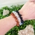 Pulseiras em cascalho com as pedras dos astros