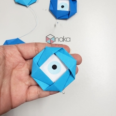 Fio de olho grego em origami na internet